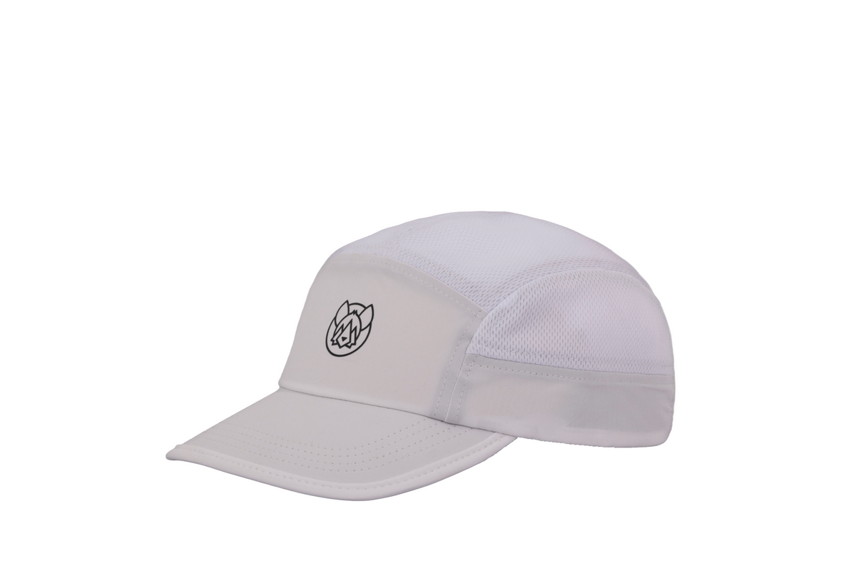Kloof Cap in Chalk, three-quarter view showing the Wild Within logo and mesh panels