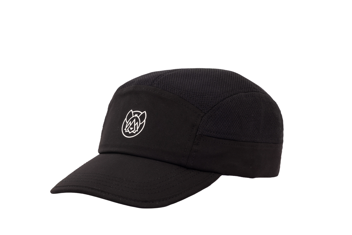 Kloof Cap in Coal, three-quarter view showing the Wild Within logo and mesh panels